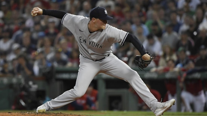 Aug 13, 2022; Boston, Massachusetts, USA;  New York Yankees relief pitcher Scott Effross (59) pitches during the ninth inning against the Boston Red Sox at Fenway Park. Mandatory Credit: Bob DeChiara-USA TODAY Sports