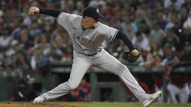 Aug 13, 2022; Boston, Massachusetts, USA;  New York Yankees relief pitcher Scott Effross (59) pitches during the ninth inning against the Boston Red Sox at Fenway Park. Mandatory Credit: Bob DeChiara-USA TODAY Sports