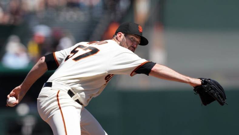 Aug 14, 2022; San Francisco, California, USA; San Francisco Giants starting pitcher Alex Wood (57) throws a pitch against the Pittsburgh Pirates during the fourth inning at Oracle Park. Mandatory Credit: Darren Yamashita-USA TODAY Sports