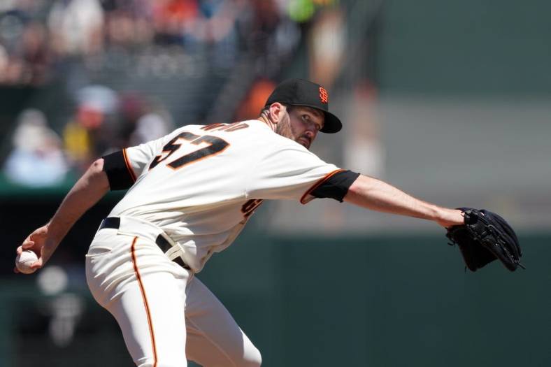 Aug 14, 2022; San Francisco, California, USA; San Francisco Giants starting pitcher Alex Wood (57) throws a pitch against the Pittsburgh Pirates during the fourth inning at Oracle Park. Mandatory Credit: Darren Yamashita-USA TODAY Sports