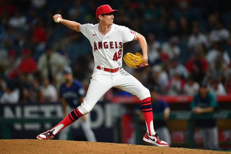 Aug 16, 2022; Anaheim, California, USA; Los Angeles Angels relief pitcher Jimmy Herget (46) throws against the Seattle Mariners during the sixth inning at Angel Stadium. Mandatory Credit: Gary A. Vasquez-USA TODAY Sports