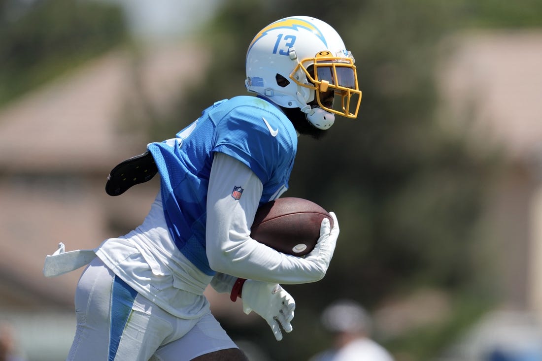 Aug 17, 2022; Costa Mesa, CA, USA; Los Angeles Chargers receiver Keenan Allen (13) runs with the ball against the Dallas Cowboys during joint practice at Jack Hammett Sports Complex. Mandatory Credit: Kirby Lee-USA TODAY Sports