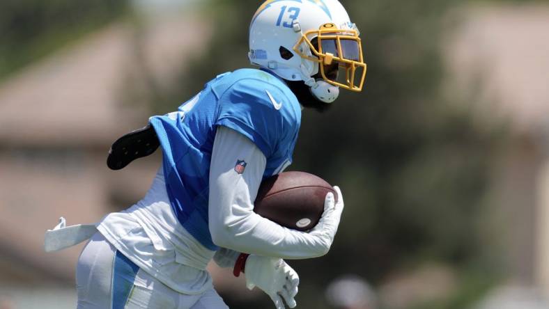 Aug 17, 2022; Costa Mesa, CA, USA; Los Angeles Chargers receiver Keenan Allen (13) runs with the ball against the Dallas Cowboys during joint practice at Jack Hammett Sports Complex. Mandatory Credit: Kirby Lee-USA TODAY Sports