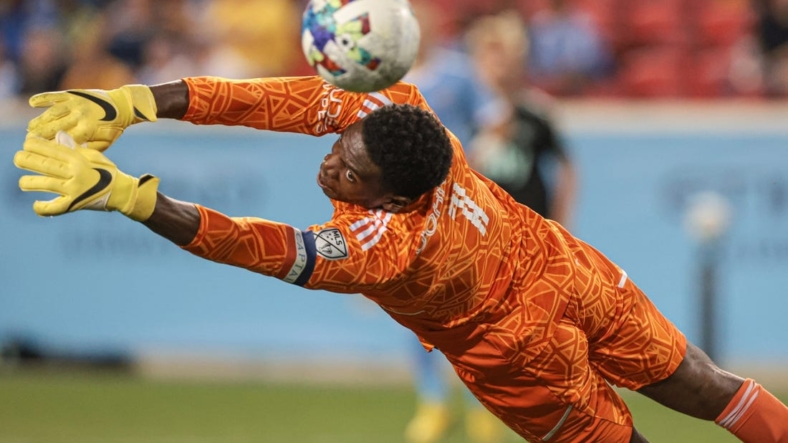 Aug 17, 2022; Harrison, New Jersey, USA; New York City FC goalkeeper Sean Johnson (1) cannot stop a shot by Charlotte FC midfielder Brandt Bronico (not pictured) for a goal during the second half at Red Bull Arena. Mandatory Credit: Vincent Carchietta-USA TODAY Sports