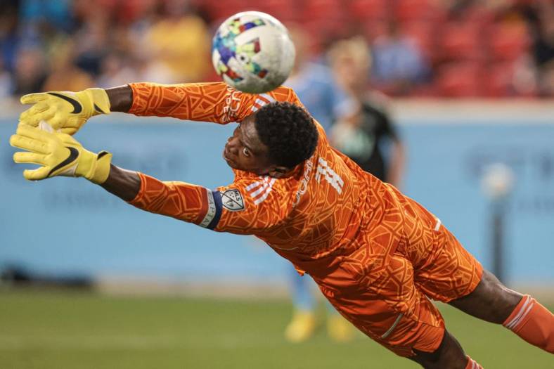 Aug 17, 2022; Harrison, New Jersey, USA; New York City FC goalkeeper Sean Johnson (1) cannot stop a shot by Charlotte FC midfielder Brandt Bronico (not pictured) for a goal during the second half at Red Bull Arena. Mandatory Credit: Vincent Carchietta-USA TODAY Sports