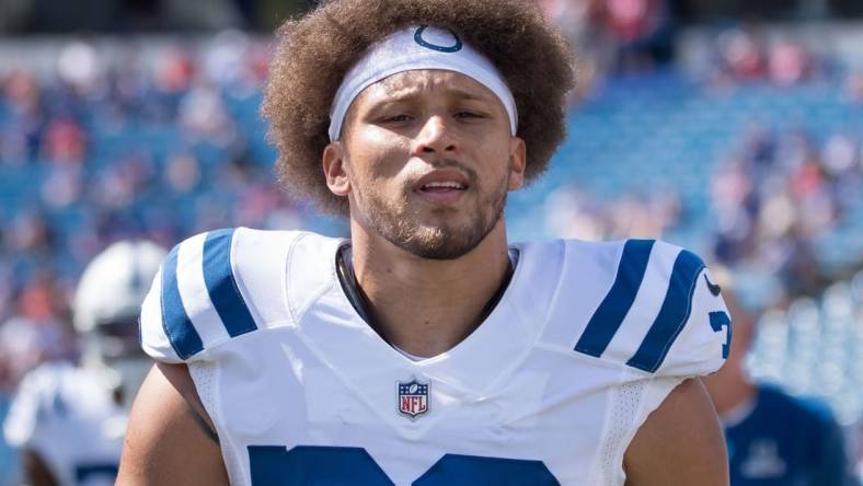 Aug 13, 2022; Orchard Park, New York, USA; Indianapolis Colts running back Phillip Lindsay (30) warms up before a pre-season game against the Buffalo Bills at Highmark Stadium. Mandatory Credit: Mark Konezny-USA TODAY Sports