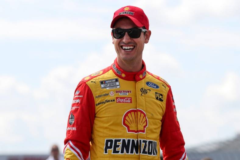 Aug 20, 2022; Watkins Glen, New York, USA; NASCAR Cup Series driver Joey Logano walks on pit road during practice and qualifying for the Go Bowling at The Glen at Watkins Glen International. Mandatory Credit: Matthew OHaren-USA TODAY Sports