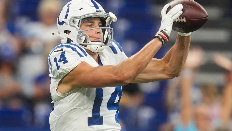 Aug 20, 2022; Indianapolis, Indiana, USA;   Indianapolis Colts wide receiver Alec Pierce (14) catches the ball during pregame warm-up before the game against the Detroit Lions on Saturday, August 20, 2022 at Lucas Oil Stadium in Indianapolis. Mandatory Credit: Grace Hollars-USA TODAY Sports