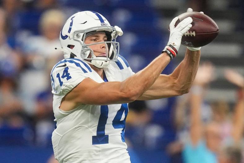 Aug 20, 2022; Indianapolis, Indiana, USA;   Indianapolis Colts wide receiver Alec Pierce (14) catches the ball during pregame warm-up before the game against the Detroit Lions on Saturday, August 20, 2022 at Lucas Oil Stadium in Indianapolis. Mandatory Credit: Grace Hollars-USA TODAY Sports