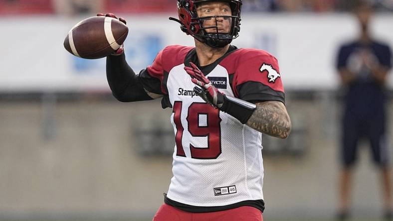 Aug 20, 2022; Toronto, Ontario, CAN; Calgary Stampeders quarterback Bo Levi Mitchell (19) throws against the Toronto Argonauts at BMO Field. Mandatory Credit: John E. Sokolowski-USA TODAY Sports