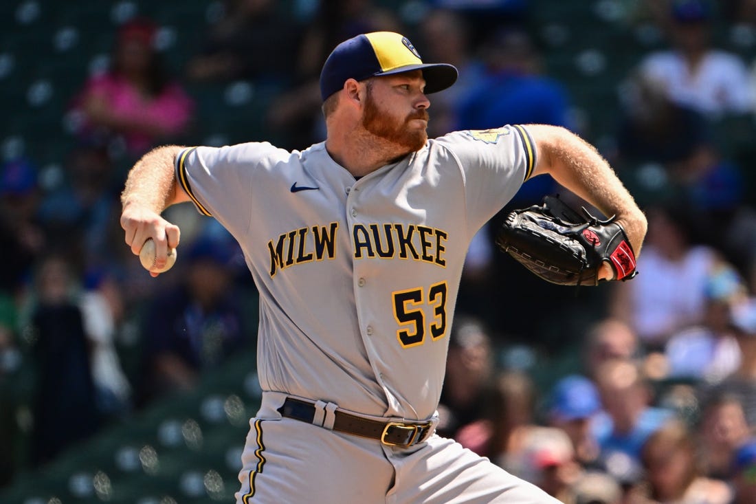 Aug 21, 2022; Chicago, Illinois, USA; Milwaukee Brewers starting pitcher Brandon Woodruff (53) delivers the baseball in the first inning against the Chicago Cubs at Wrigley Field. Mandatory Credit: Quinn Harris-USA TODAY Sports