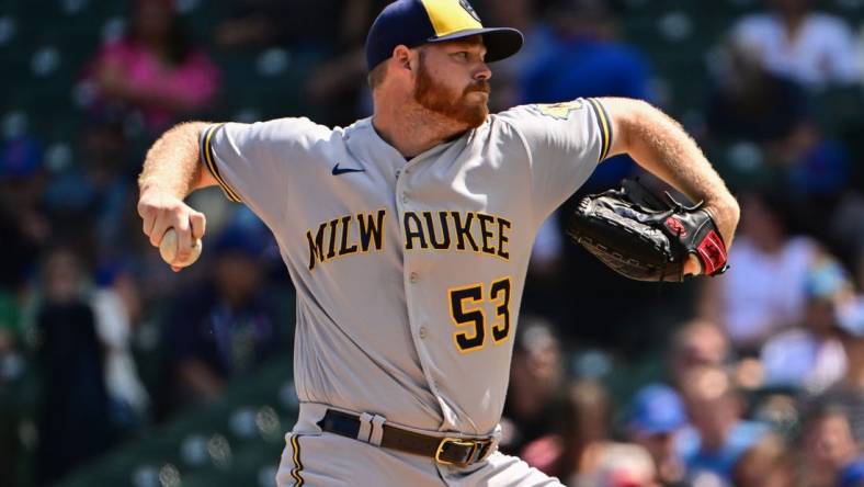 Aug 21, 2022; Chicago, Illinois, USA; Milwaukee Brewers starting pitcher Brandon Woodruff (53) delivers the baseball in the first inning against the Chicago Cubs at Wrigley Field. Mandatory Credit: Quinn Harris-USA TODAY Sports