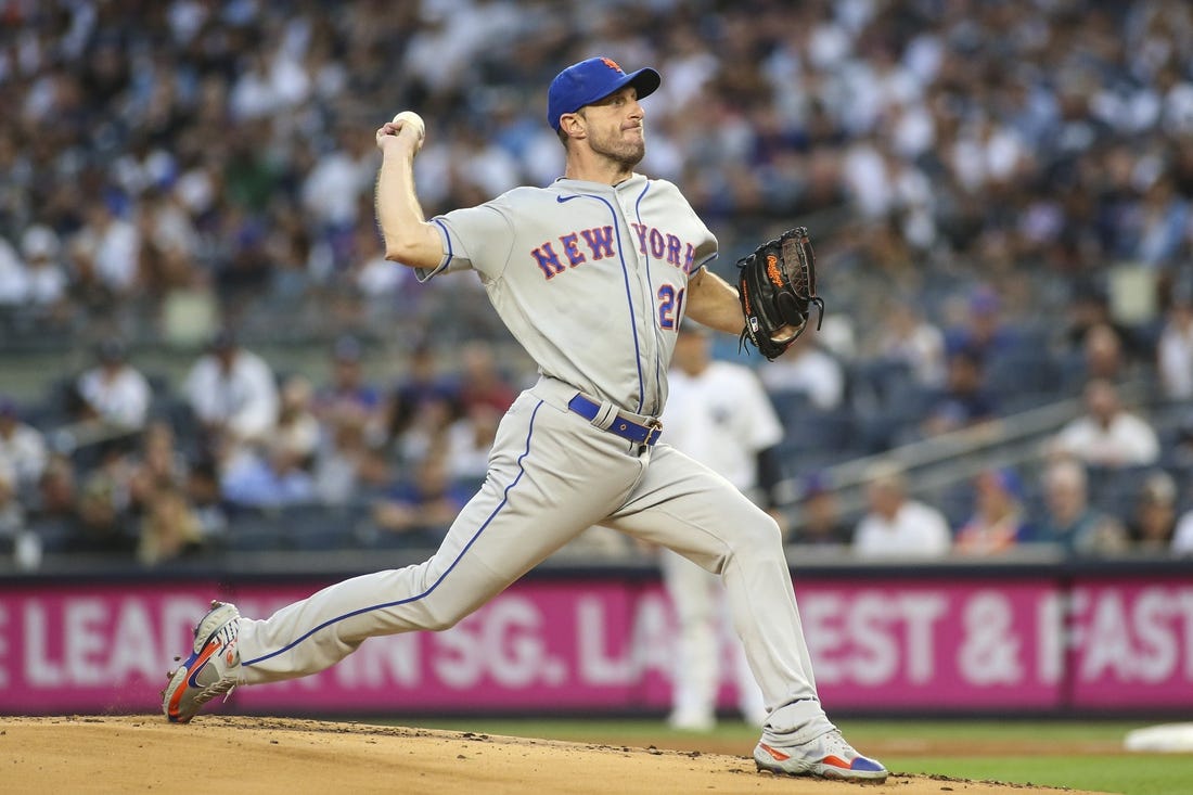 Aug 22, 2022; Bronx, New York, USA;  New York Mets starting pitcher Max Scherzer (21) pitches in the first inning against the New York Yankees at Yankee Stadium. Mandatory Credit: Wendell Cruz-USA TODAY Sports