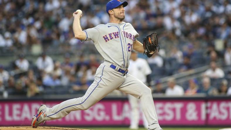 Aug 22, 2022; Bronx, New York, USA;  New York Mets starting pitcher Max Scherzer (21) pitches in the first inning against the New York Yankees at Yankee Stadium. Mandatory Credit: Wendell Cruz-USA TODAY Sports