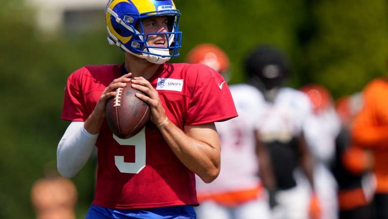 Los Angeles Rams quarterback Matthew Stafford (9) drops back to pass during a joint practice with the Cincinnati Bengals, Wednesday, Aug. 24, 2022, at the Paycor Stadium practice fields in Cincinnati.

Los Angeles Rams At Cincinnati Bengals Joint Practice Aug 24 0047