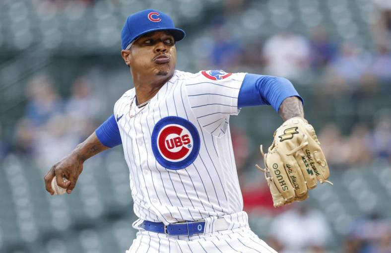 Aug 25, 2022; Chicago, Illinois, USA; Chicago Cubs starting pitcher Marcus Stroman (0) throws a pitch against the St. Louis Cardinals during the first inning at Wrigley Field. Mandatory Credit: Kamil Krzaczynski-USA TODAY Sports