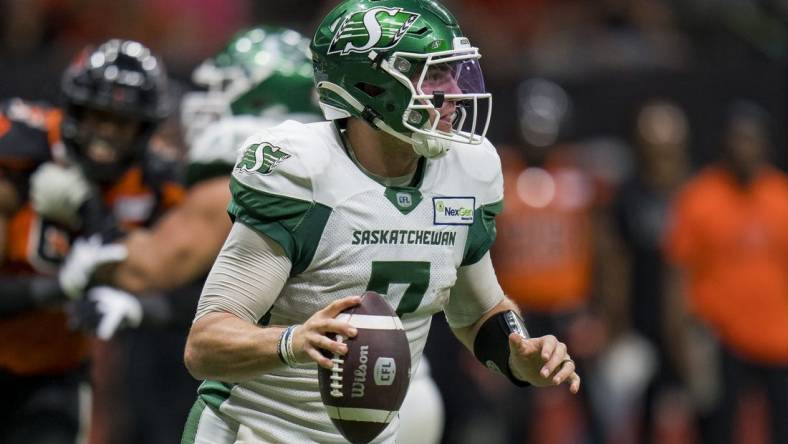 Aug 26, 2022; Vancouver, British Columbia, CAN; Saskatchewan Roughriders quarterback Cody Fajardo (7) looks to pass against the BC Lions in the second half at BC Place. Mandatory Credit: Bob Frid-USA TODAY Sports