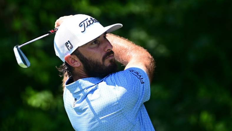 Aug 27, 2022; Atlanta, Georgia, USA; Max Homa tees off on the 2nd hole during the third round of the TOUR Championship golf tournament. Mandatory Credit: Adam Hagy-USA TODAY Sports