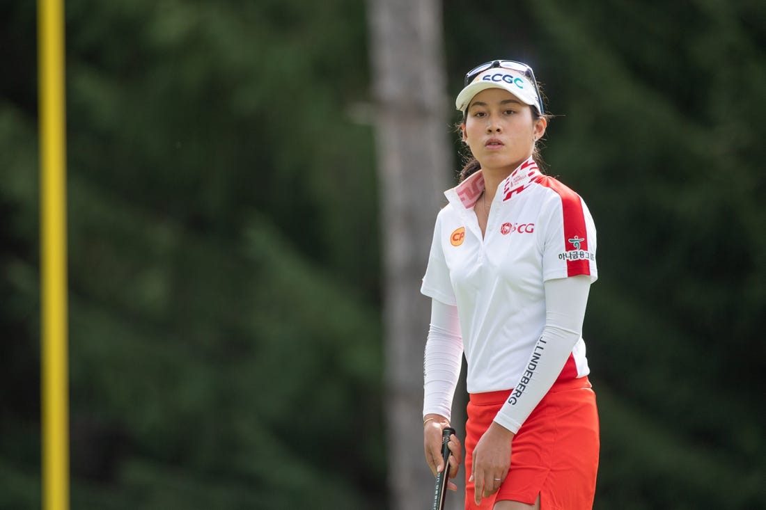 Aug 27, 2022; Ottawa, Ontario, CAN; Atthaya Thitikul from Tailand gets ready to play ofrom the 2nd hole fairway during the third round of the CP Women's Open golf tournament. Mandatory Credit: Marc DesRosiers-USA TODAY Sports