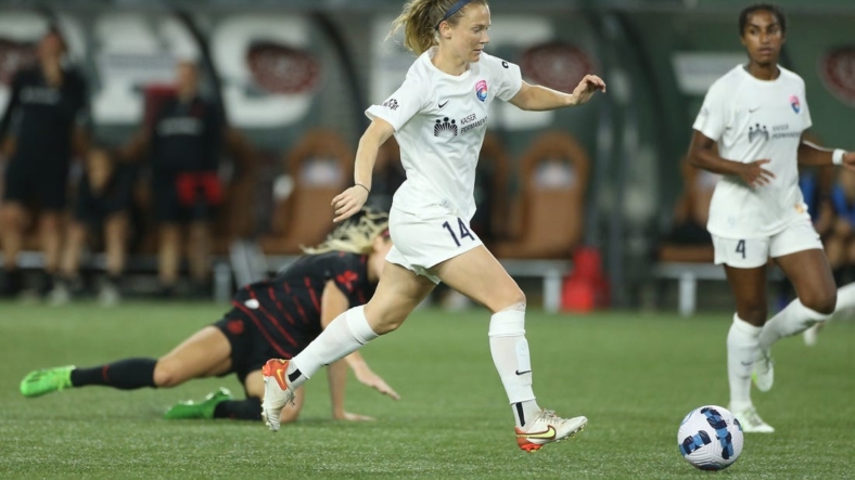 Aug 27, 2022; Portland, Oregon, USA; San Diego Wave FC midfielder Kristen McNabb (14) moves the ball against Portland Thorns FC during the second half at Providence Park. Mandatory Credit: Craig Mitchelldyer-USA TODAY Sports
