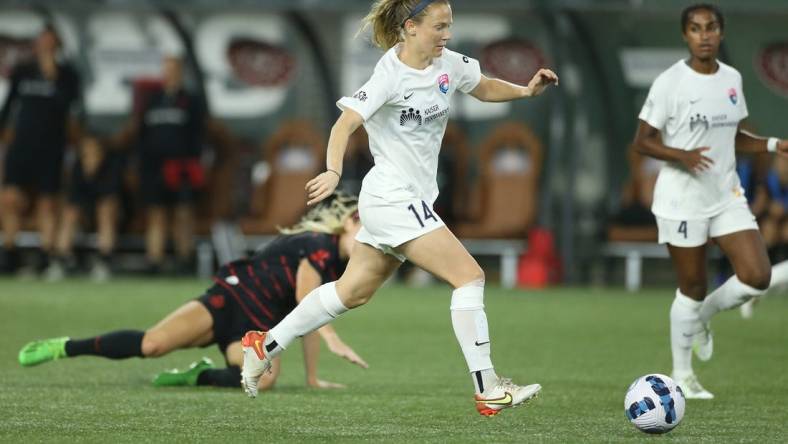 Aug 27, 2022; Portland, Oregon, USA; San Diego Wave FC midfielder Kristen McNabb (14) moves the ball against Portland Thorns FC during the second half at Providence Park. Mandatory Credit: Craig Mitchelldyer-USA TODAY Sports