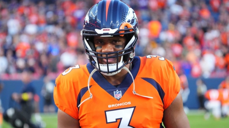 Aug 27, 2022; Denver, Colorado, USA; Denver Broncos quarterback Russel Wilson (3) in the first quarter of their game against the Minnesota Vikings at Empower Field at Mile High. Mandatory Credit: Ron Chenoy-USA TODAY Sports