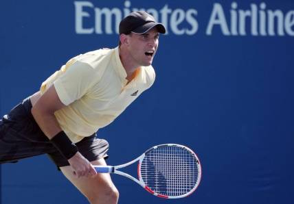 Aug 29, 2022; Flushing, NY, USA;  Dominic Thiem of Austria serves during his match against Pablo Carreno Busta of Spain on day one of the 2022 U.S. Open tennis tournament at USTA Billie Jean King National Tennis Center. Mandatory Credit: Jerry Lai-USA TODAY Sports