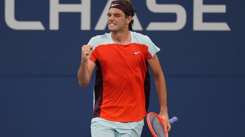 Aug 29, 2022; Flushing, NY, USA;  Taylor Fritz of the United States celebrates after winning a point against Brandon Holt of the United States on day one of the 2022 U.S. Open tennis tournament at USTA Billie Jean King National Tennis Center. Mandatory Credit: Jerry Lai-USA TODAY Sports