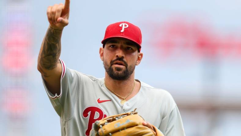 Aug 16, 2022; Cincinnati, Ohio, USA; Philadelphia Phillies right fielder Nick Castellanos (8) points to fans while running off the field at the end of the first inning in the game against the Cincinnati Reds at Great American Ball Park. Mandatory Credit: Katie Stratman-USA TODAY Sports