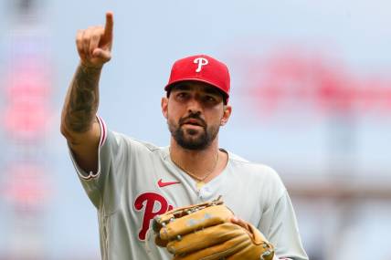 Aug 16, 2022; Cincinnati, Ohio, USA; Philadelphia Phillies right fielder Nick Castellanos (8) points to fans while running off the field at the end of the first inning in the game against the Cincinnati Reds at Great American Ball Park. Mandatory Credit: Katie Stratman-USA TODAY Sports