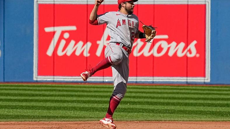 Aug 27, 2022; Toronto, Ontario, CAN; Los Angeles Angels second baseman David Fletcher (22) goes to throw to first base after a force out on Toronto Blue Jays center fielder George Springer (not pictured) during the first inning at Rogers Centre. Mandatory Credit: John E. Sokolowski-USA TODAY Sports