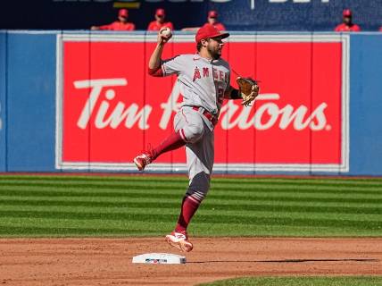 Aug 27, 2022; Toronto, Ontario, CAN; Los Angeles Angels second baseman David Fletcher (22) goes to throw to first base after a force out on Toronto Blue Jays center fielder George Springer (not pictured) during the first inning at Rogers Centre. Mandatory Credit: John E. Sokolowski-USA TODAY Sports