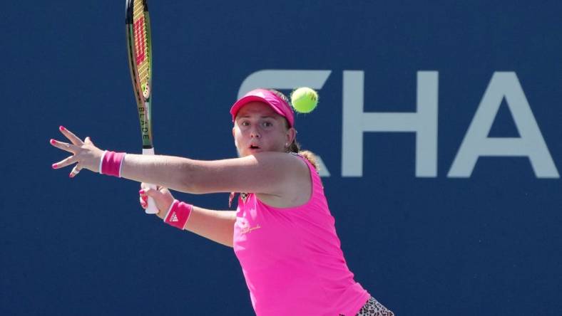 Aug 30, 2022; Flushing, NY, USA; Jelena Ostapenko of Latvia hits a shot against Qinwen Zheng of China on day two of the 2022 U.S. Open tennis tournament at USTA Billie Jean King National Tennis Center. Mandatory Credit: Jerry Lai-USA TODAY Sports