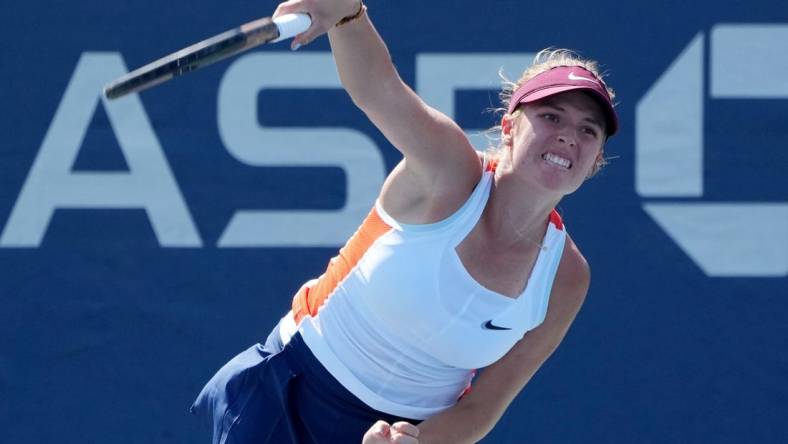 Aug 30, 2022; Flushing, NY, USA; Linda Fruhvirtova of Czech Republic in action against Xinyu Wang of China on day two of the 2022 U.S. Open tennis tournament at USTA Billie Jean King National Tennis Center. Mandatory Credit: Jerry Lai-USA TODAY Sports