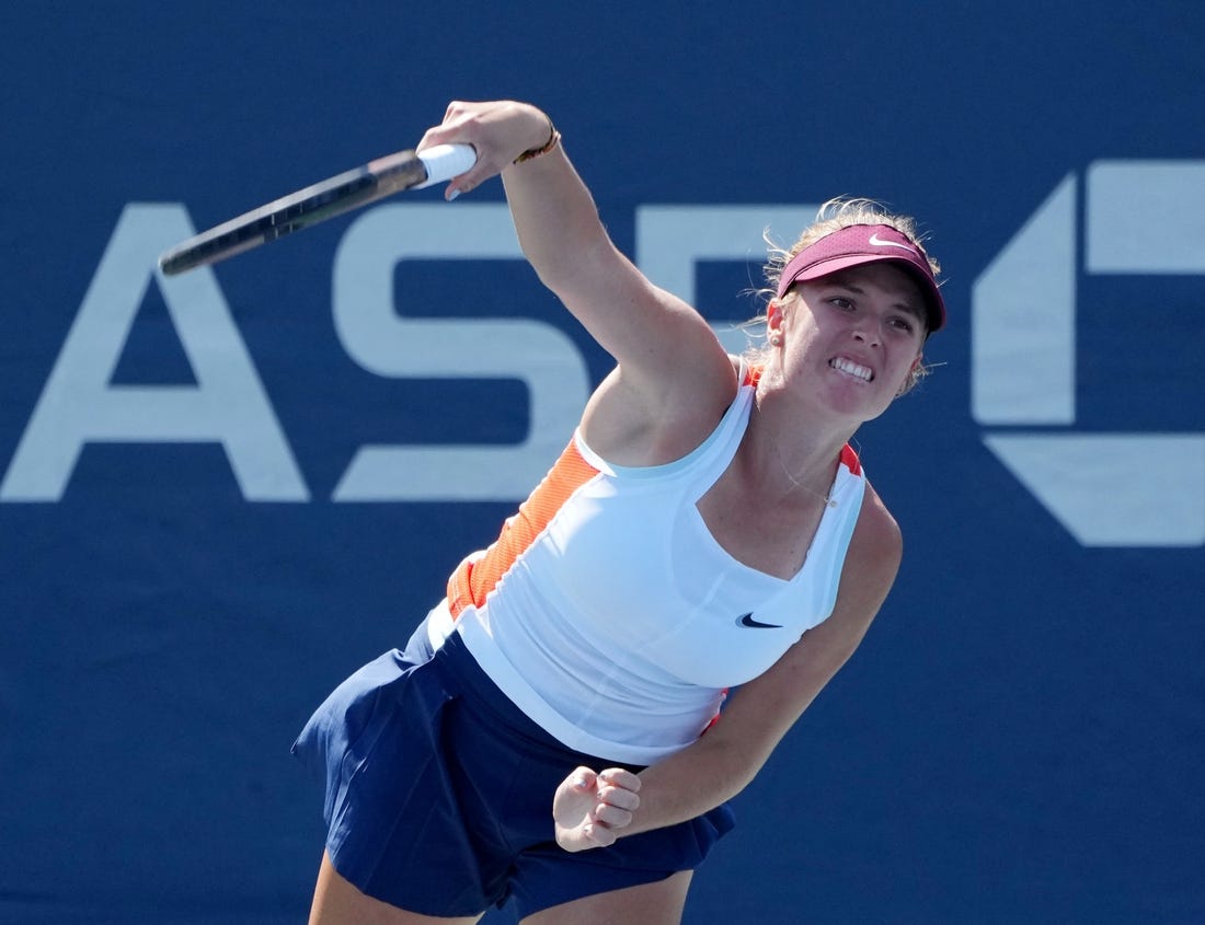 Aug 30, 2022; Flushing, NY, USA; Linda Fruhvirtova of Czech Republic in action against Xinyu Wang of China on day two of the 2022 U.S. Open tennis tournament at USTA Billie Jean King National Tennis Center. Mandatory Credit: Jerry Lai-USA TODAY Sports