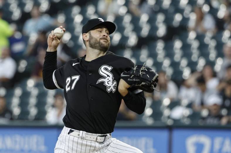 Aug 30, 2022; Chicago, Illinois, USA; Chicago White Sox starting pitcher Lucas Giolito (27) delivers against the Kansas City Royals during the first inning at Guaranteed Rate Field. Mandatory Credit: Kamil Krzaczynski-USA TODAY Sports