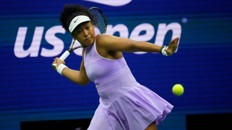 Aug 30, 2022; Flushing, NY, USA; Naomi Osaka of Japan hits to Danielle Collins of the USA on day two of the 2022 U.S. Open tennis tournament at USTA Billie Jean King National Tennis Center. Mandatory Credit: Robert Deutsch-USA TODAY Sports