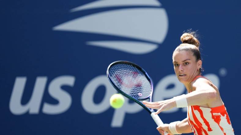 Aug 31, 2022; Flushing, NY, USA; Maria Sakkari of Greece hits to Xiyu Wang of China on day three of the 2022 U.S. Open tennis tournament at USTA Billie Jean King Tennis Center. Mandatory Credit: Danielle Parhizkaran-USA TODAY Sports