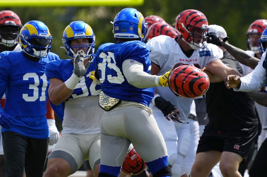 Rams defensive tackle Jonah Williams attempts to hold back Aaron Donald during a brawl during the joint practice against the Bengals.

Syndication The Enquirer