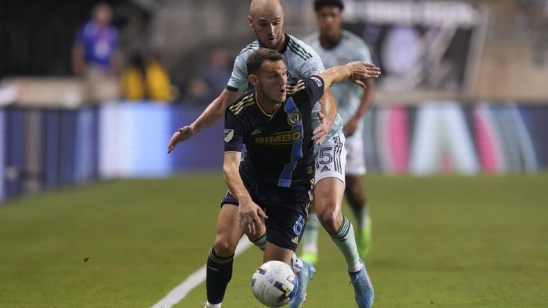 Aug 31, 2022; Chester, Pennsylvania, USA; Philadelphia Union midfielder Daniel Gazdag (6) controls the ball against Atlanta United defender Andrew Gutman (15) in the first half at Subaru Park. Mandatory Credit: Mitchell Leff-USA TODAY Sports