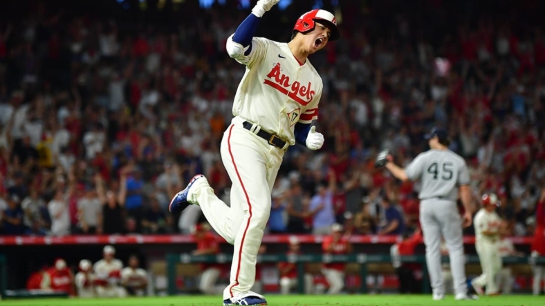 Aug 31, 2022; Anaheim, California, USA; Los Angeles Angels designated hitter Shohei Ohtani (17) reacts after hitting a three run home run against the New York Yankees during the sixth inning at Angel Stadium. Mandatory Credit: Gary A. Vasquez-USA TODAY Sports