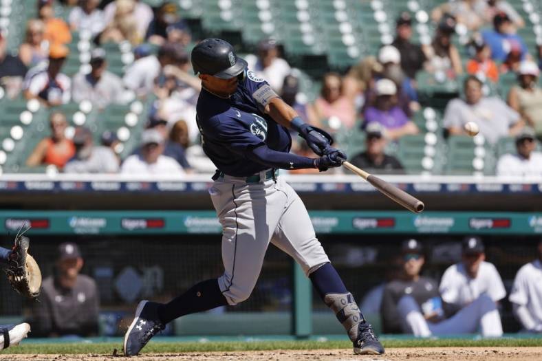 Sep 1, 2022; Detroit, Michigan, USA;  Seattle Mariners center fielder Julio Rodriguez (44) hits a home run in the third inning against the Detroit Tigers at Comerica Park. Mandatory Credit: Rick Osentoski-USA TODAY Sports