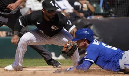 Sep 1, 2022; Chicago, Illinois, USA; Chicago White Sox third baseman Leury Garcia (28) tags out Kansas City Royals right fielder Drew Waters (6) at third base during the fifth inning at Guaranteed Rate Field. Mandatory Credit: David Banks-USA TODAY Sports