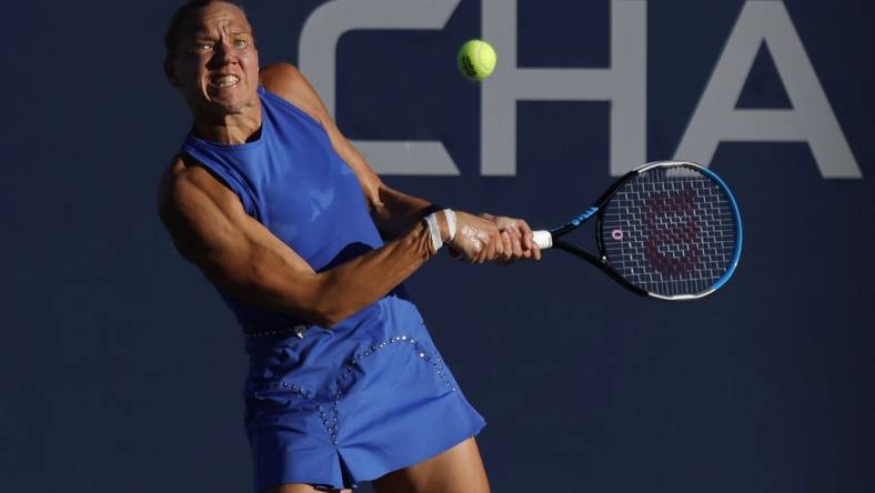 Sep 1, 2022; Flushing, NY, USA; Kaia Kanepi (EST) hits a backhand against Aryna Sabalenka (not pictured) on day four of the 2022 U.S. Open tennis tournament at USTA Billie Jean King Tennis Center. Mandatory Credit: Geoff Burke-USA TODAY Sports