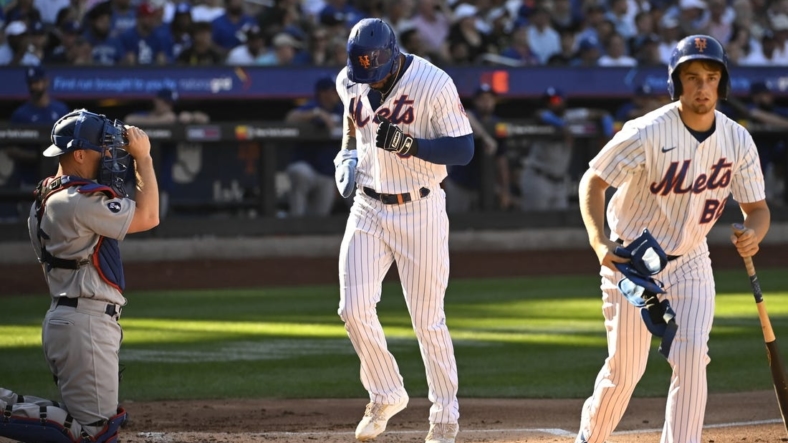 Sep 1, 2022; New York City, New York, USA; New York Mets right fielder Starling Marte (6) scores a run on a bases loaded walk against the Los Angeles Dodgers during the first inning at Citi Field. Mandatory Credit: Gregory Fisher-USA TODAY Sports