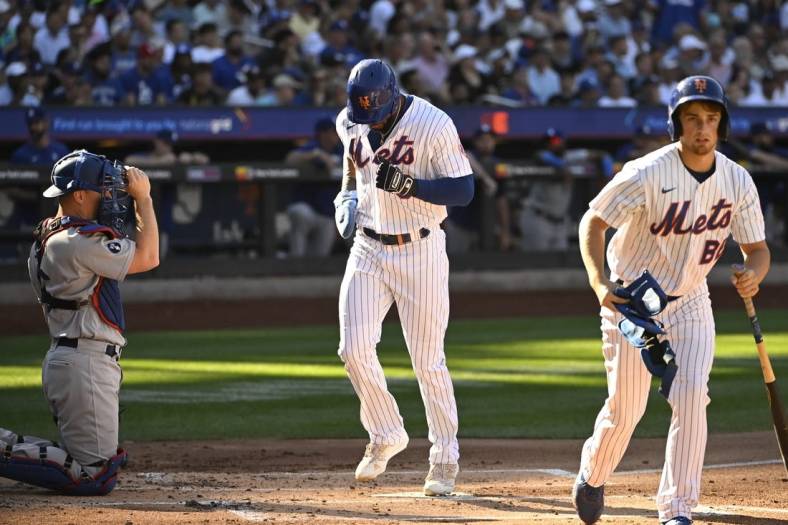 Sep 1, 2022; New York City, New York, USA; New York Mets right fielder Starling Marte (6) scores a run on a bases loaded walk against the Los Angeles Dodgers during the first inning at Citi Field. Mandatory Credit: Gregory Fisher-USA TODAY Sports