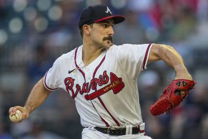 Sep 1, 2022; Cumberland, Georgia, USA; Atlanta Braves starting pitcher Spencer Strider (65) pitches against the Colorado Rockies during the first inning at Truist Park. Mandatory Credit: Dale Zanine-USA TODAY Sports