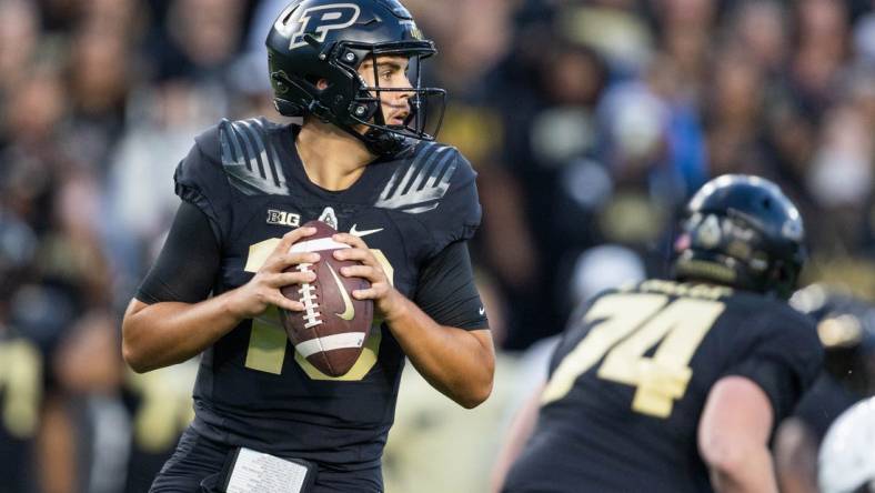 Sep 1, 2022; West Lafayette, Indiana, USA;  Purdue Boilermakers quarterback Aidan O'Connell (16) passes the ball in the first quarter against the Penn State Nittany Lions  at Ross-Ade Stadium. Mandatory Credit: Trevor Ruszkowski-USA TODAY Sports