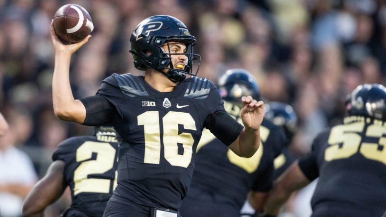 Sep 1, 2022; West Lafayette, Indiana, USA;  Purdue Boilermakers quarterback Aidan O'Connell (16) passes the ball in the first quarter against the Penn State Nittany Lions  at Ross-Ade Stadium. Mandatory Credit: Trevor Ruszkowski-USA TODAY Sports