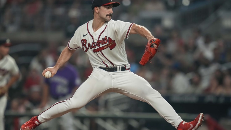 Sep 1, 2022; Cumberland, Georgia, USA; Atlanta Braves starting pitcher Spencer Strider (65) pitches against the Colorado Rockies during the fifth inning at Truist Park. Mandatory Credit: Dale Zanine-USA TODAY Sports